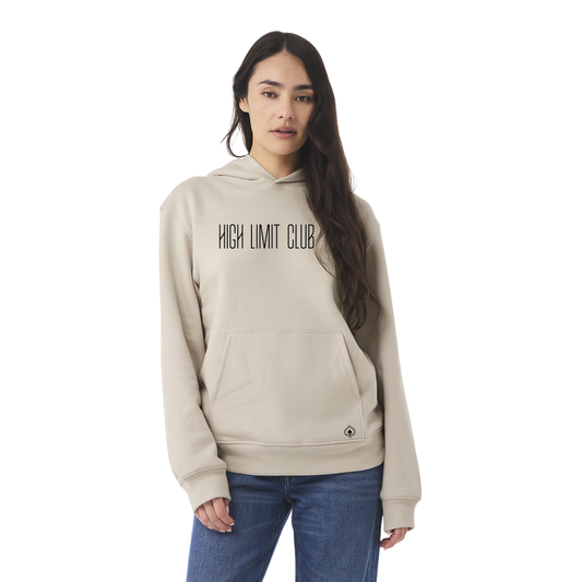 Woman wearing a beige hoodie with 'High Limit Club' text on a white background gamble las vegas casino slots
